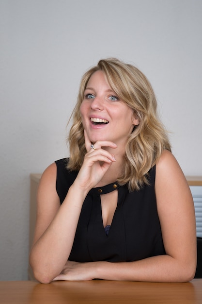 Closeup portrait of cute young business woman smiling