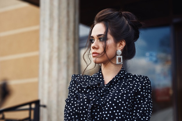 Closeup portrait of elegant business woman with make up outdoor