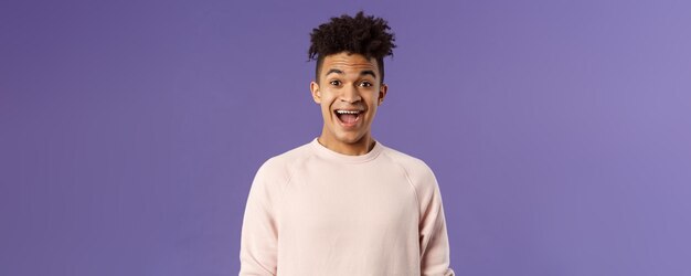 Closeup portrait of enthusiastic excited and surprised hispanic guy hear amazing news open mouth bea