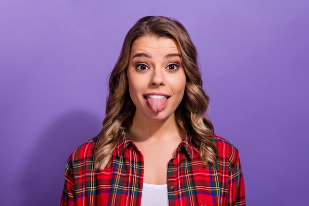 Photo closeup portrait of funky comic girl showing healthy tongue