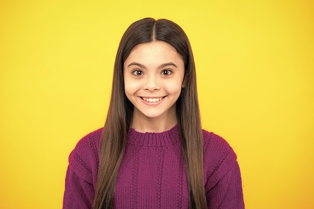 Closeup portrait of girl teen smile happiness face Portrait of a cute teen child Studio shot isolated background