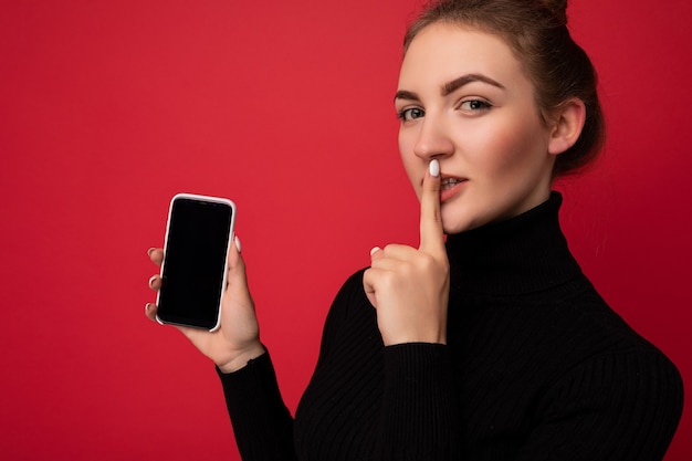 Photo closeup portrait photo of beautiful young brunette woman wearing black sweater standing