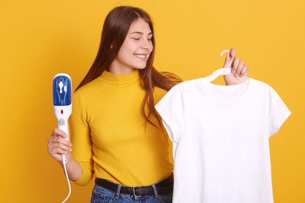 Closeup portrait of smiling woman wearing yellow casual shirt