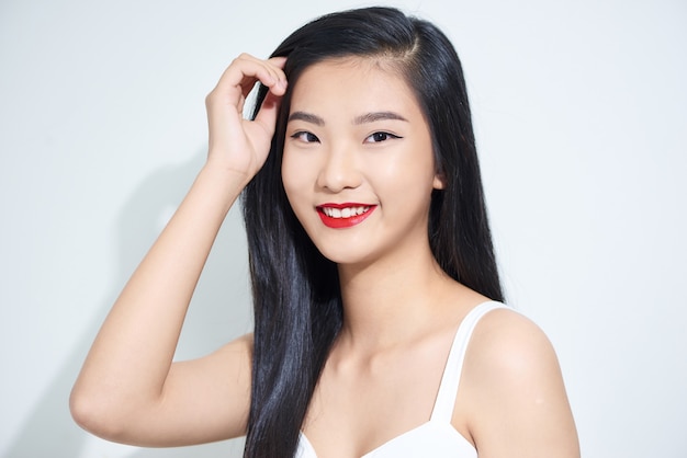 Closeup portrait of a young attractive Asian woman