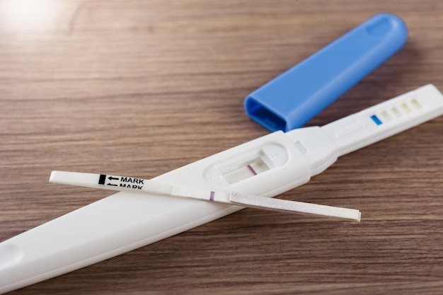 Closeup pregnancy test with negative pregnant