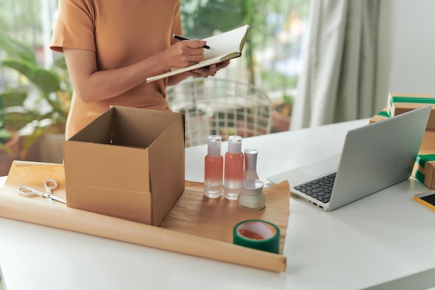 Closeup of preparing a parcel on the table