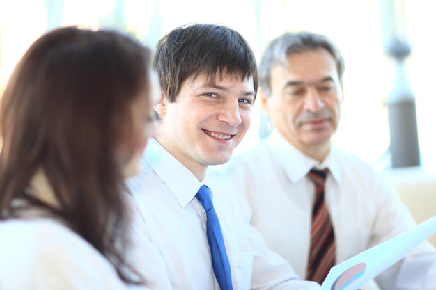 Closeup professional business team discussing financial charts