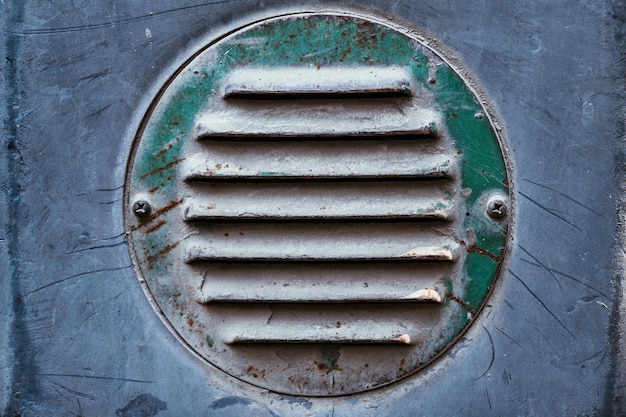 Closeup of protective rusted ventilation grill