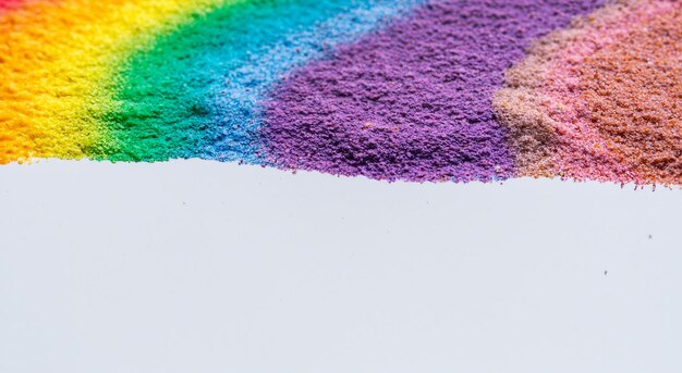 Photo closeup of rainbow colored sand streaks vivid colors