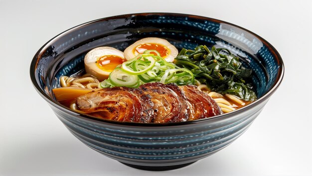 closeup of ramen soup with pork boiled egg and green onions in a blue ceramic bowl asian cuisine