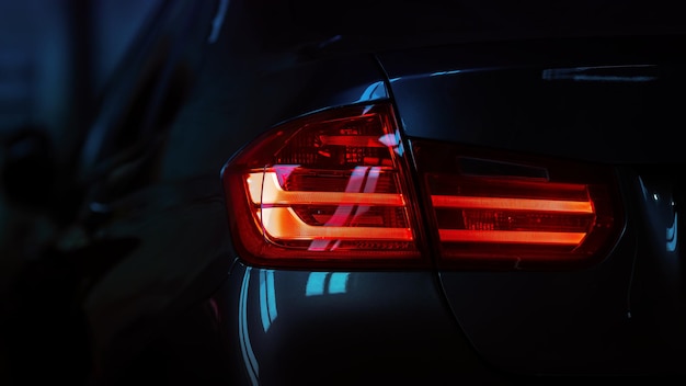 Photo closeup of a red led taillight on a modern car