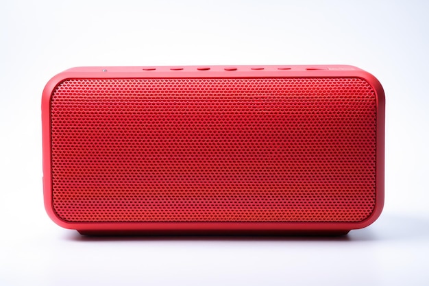 Closeup of red portable wireless speaker on white background