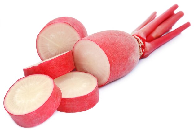 Closeup of red radish over white background