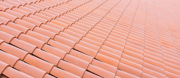 Photo closeup of the red roof tiles sbackdrop