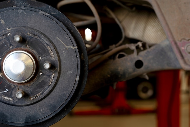 Closeup repair disc brakes of car 