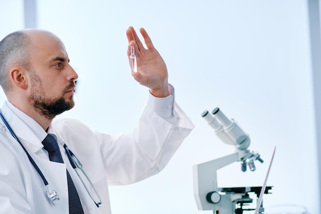 Closeup researcher conducts testing in the laboratory