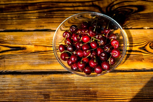 Closeup of ripe red cherries lying on a table