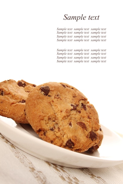 Closeup of round chocolate biscuits are on the plate