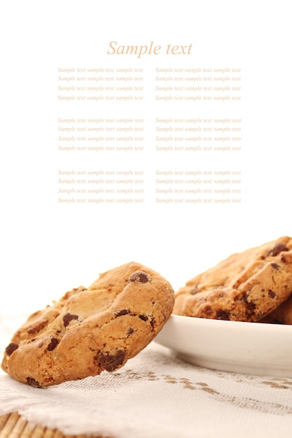 Closeup of round chocolate biscuits are on the plate