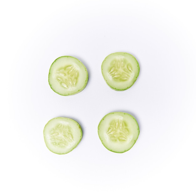 Closeup of roundcut cucumber isolated on a white background