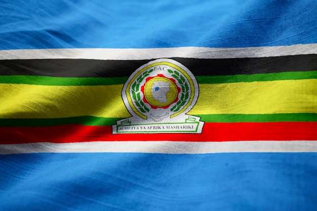 Photo closeup of ruffled east african community flag