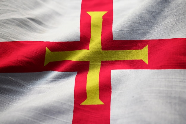 Closeup of Ruffled Guernsey Flag, Guernsey Flag Blowing in Wind