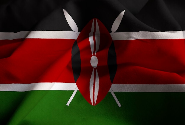 Photo closeup of ruffled kenya flag, kenya flag blowing in wind