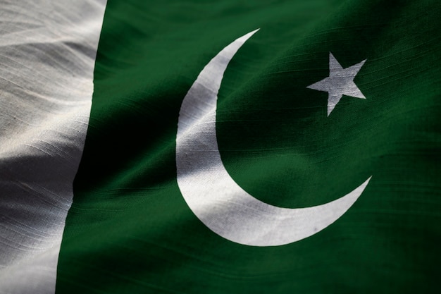 Photo closeup of ruffled pakistan flag, pakistan flag blowing in wind