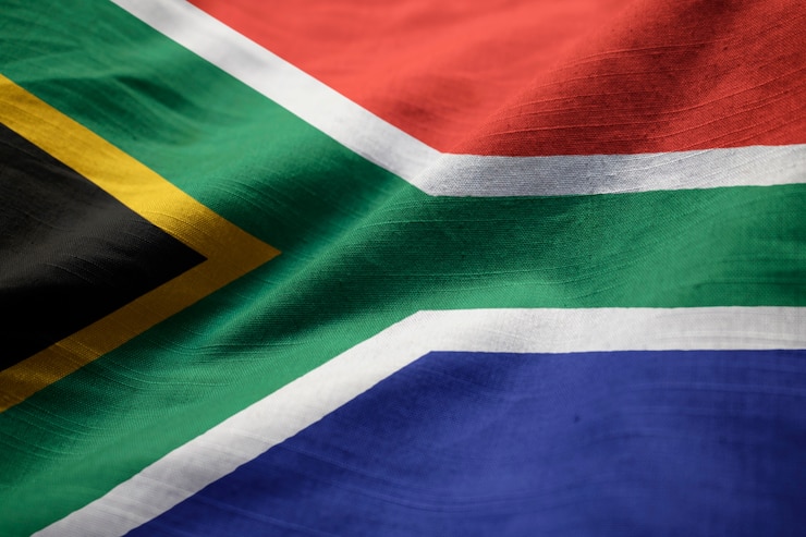Photo closeup of ruffled south africa flag, south africa flag blowing in wind