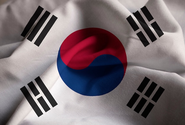Foto primo piano della bandiera increspata della corea del sud, bandiera della corea del sud che soffia in vento