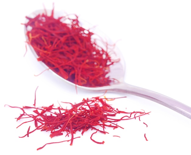Closeup of Saffron used as food additive over white background