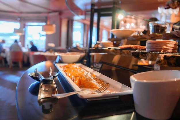 Closeup of salmon served on table in restaurant at luxury hotel