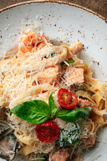 Closeup on salmon tagliatelle pasta