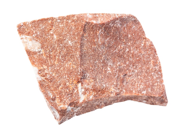 closeup of sample of natural mineral from geological collection unpolished red marble rock isolated on white background