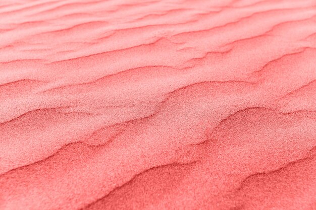 Photo closeup of sand pattern of a beach in the summer