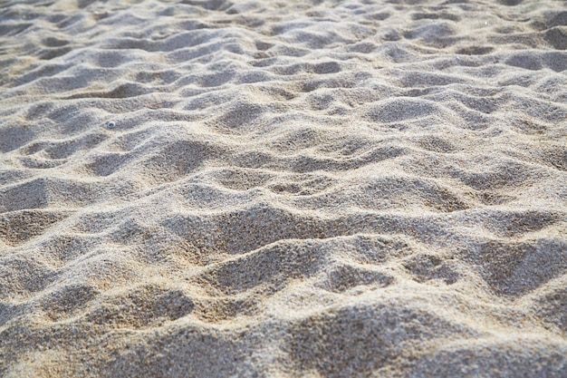 closeup of sand pattern of a beach in the summer