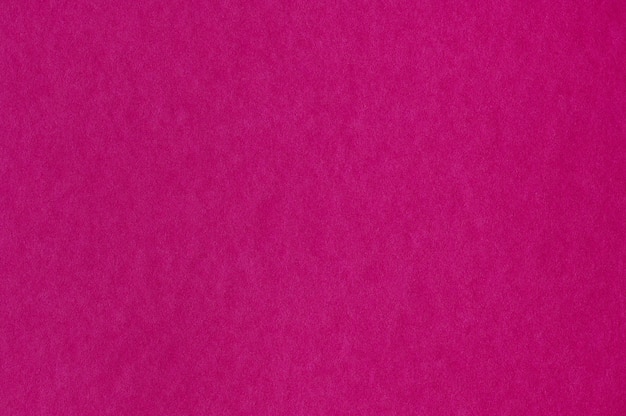 Closeup of seamless pink paper texture for background or artworks