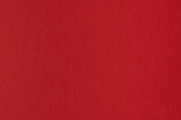 Photo closeup of seamless red paper texture for background or artworks