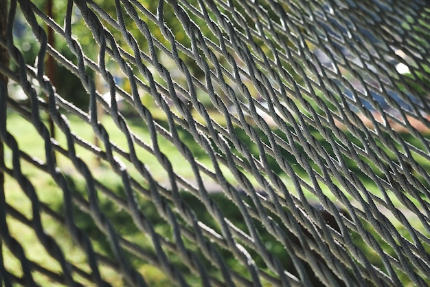 Closeup selective focus on ropes on an old hammock Idea for a background or screensaver