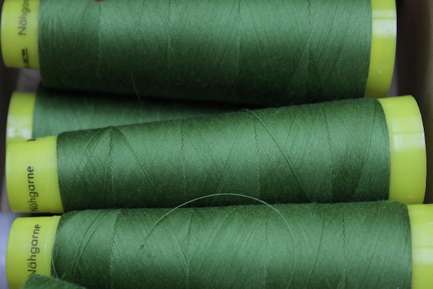 Closeup of sewing thread Large green coil