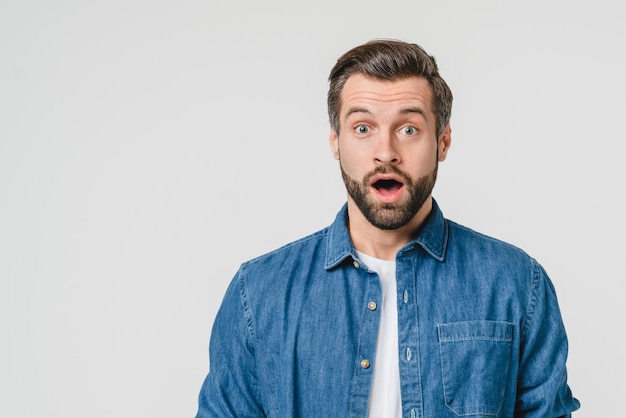 closeup shocked disappointed caucasian young man expressing emotions for sale discount hearing good bad news isolated in white background