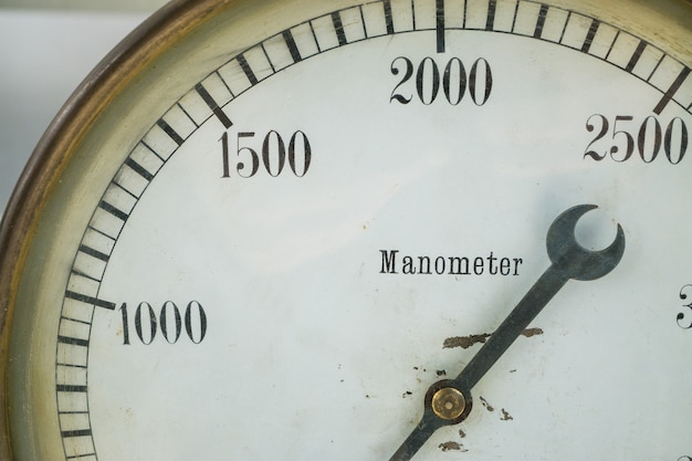 Closeup shot of analog manometer equipment which measure pressure of gas or liquid test gauge