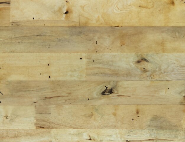 Foto colpo del primo piano di una superficie di legno splendidamente strutturata perfetta per sfondi e progetti di design