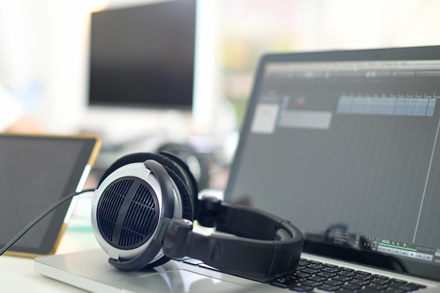 Closeup shot of computer headphones in recording studio