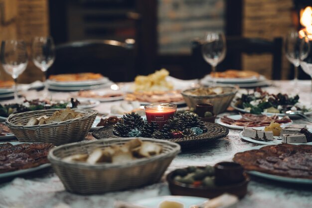Closeup shot of a dinner table with various dishes
