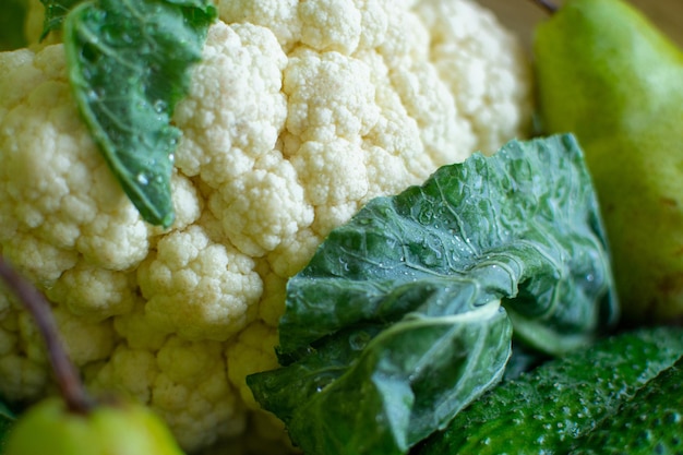 Closeup shot of fresh and juicy cauliflower cucumbers and pears