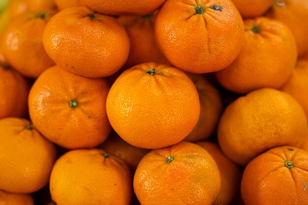 A closeup shot of mandarins piled up on each other in Singapore