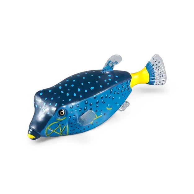 Photo closeup shot of miniature toy animal blue boxfish on white background