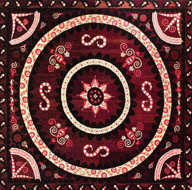 A closeup shot of national ornaments and patterns of Central Asia on fabric