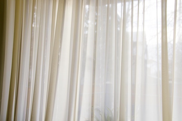 写真 美しい澄んだベージュのカーテン - インテリアのクローズ アップ ショット
